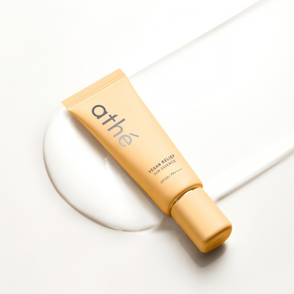 Why do high-protection sunscreens often feel heavy on skin?