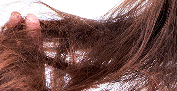 How can I tame frizz without weighing my hair down?