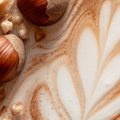 Adopt Lady Glitter with a close-up detail of a swirled texture resembling coffee art with nuts