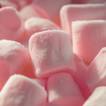 Adopt Love Mood marshmallows, a close-up showing the soft pink texture and sugary coating of the sweet candies