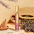 Adopt Provence Soleia Eau de Parfum in a clear bottle with a gold cap, featuring a colorful paisley label,