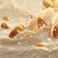 Adopt Rose Diamant product image showing almonds and liquid splashing, highlighting the texture and ingredients