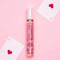 Bioheal BOH PROBIODERM Collagen Volume Lip Balm in a pink bottle with playing cards on a pink background