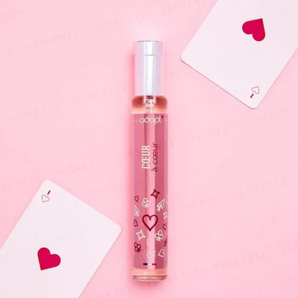 Bioheal BOH PROBIODERM Collagen Volume Lip Balm in a pink bottle with playing cards on a pink background
