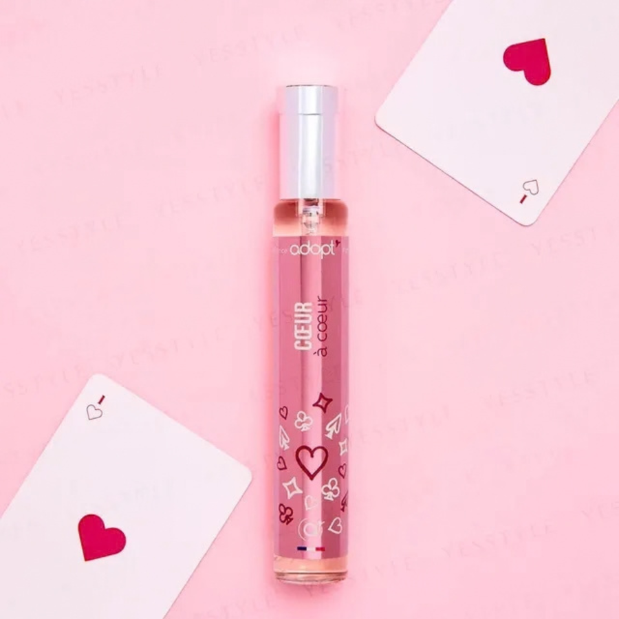 Bioheal BOH PROBIODERM Collagen Volume Lip Balm in a pink bottle with playing cards on a pink background