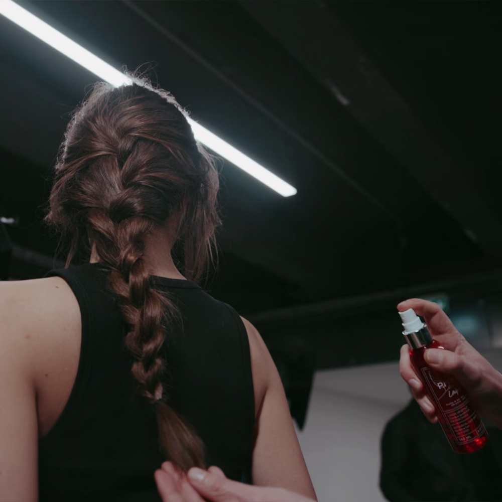 Why does hairspray always leave my strands feeling stiff?