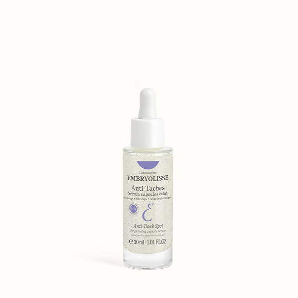Embryolisse Brightening Capsule Serum 30ml in a clear dropper bottle, with a white cap, on a white background