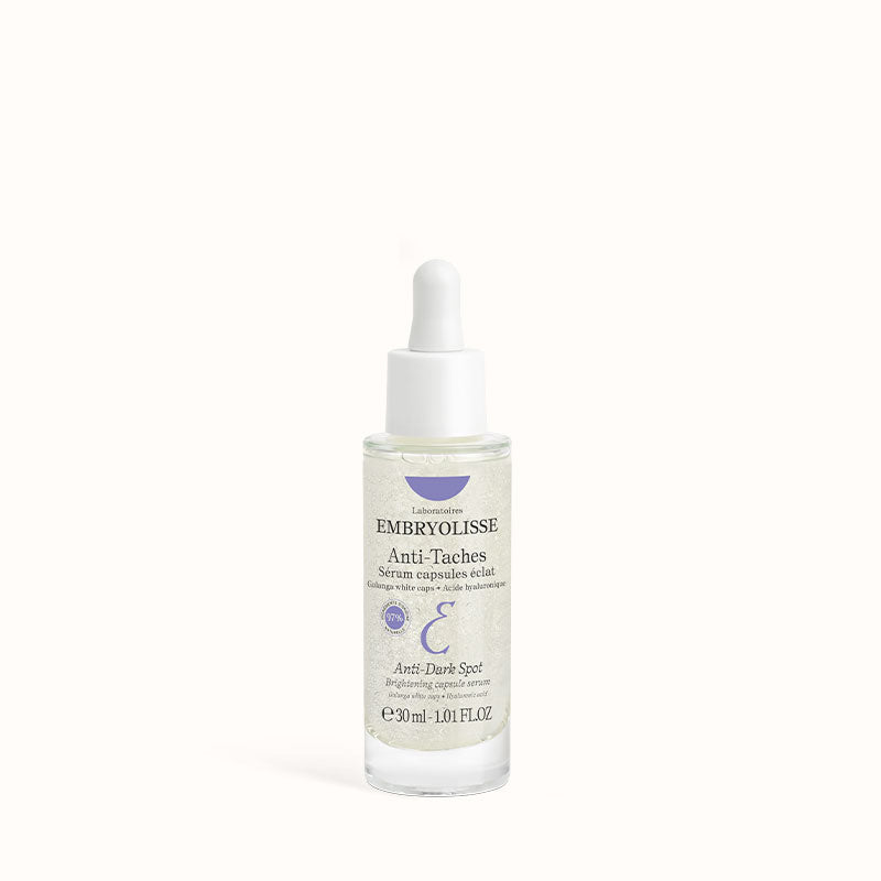 Embryolisse Brightening Capsule Serum 30ml in a clear dropper bottle, with a white cap, on a white background