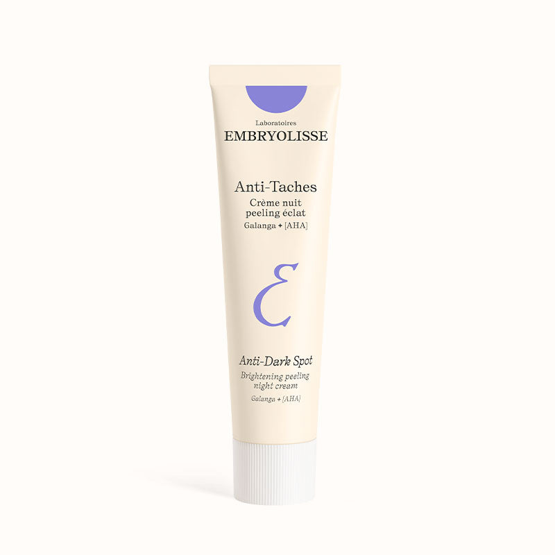 Embryolisse Brightening Peeling Night Cream in a tube, front view on a white background,