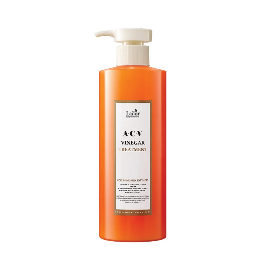 Lador ACV Vinegar Treatment in an orange pump bottle, front view on a white background, for shine and softness