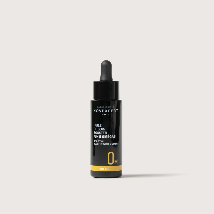 Novexpert Booster Serum with 5 Omegas, a beauty oil for skin, in a black dropper bottle on a white background