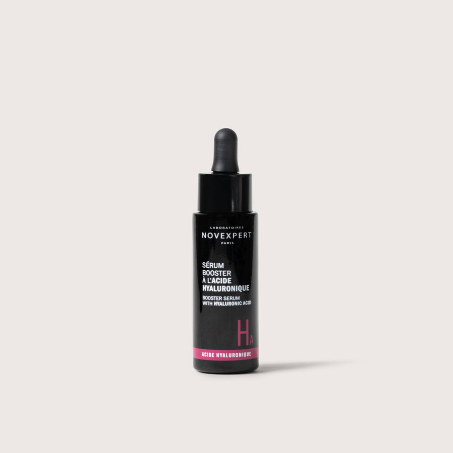 Novexpert Booster Serum with Hyaluronic Acid in a black bottle with a dropper, front view on a white background