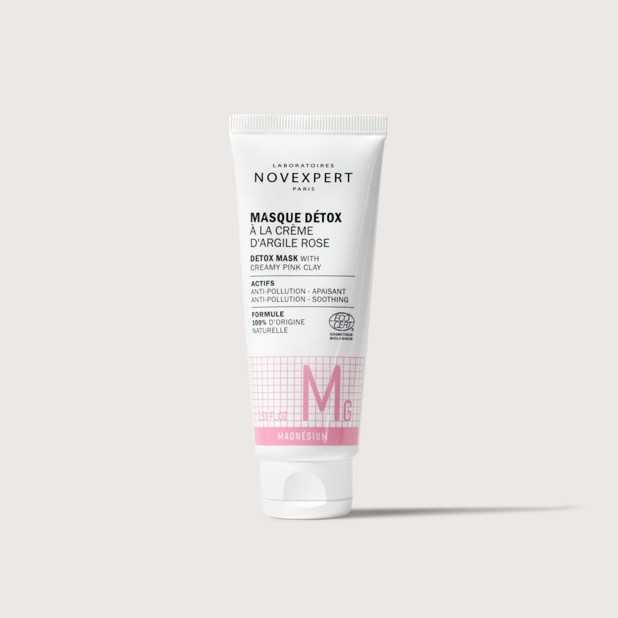 Novexpert Detox Mask with Creamy Pink Clay in a white tube with pink accents on a white background