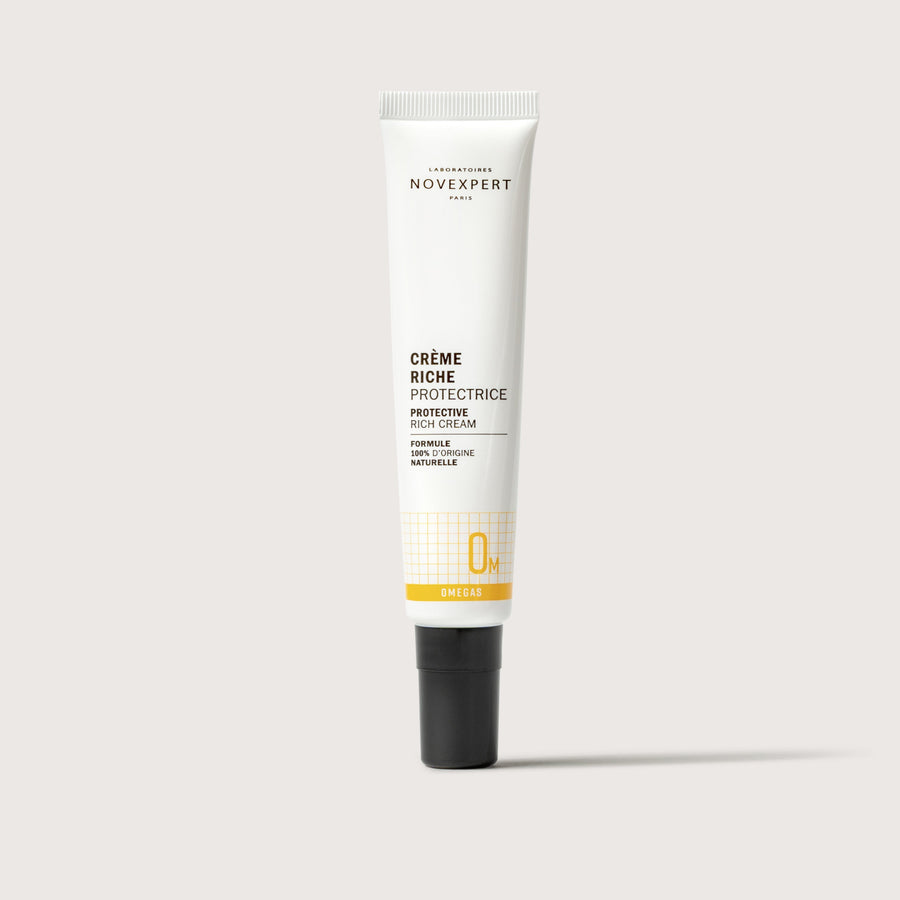Novexpert Protective Rich Cream in a white tube with a black cap, front view on a white background