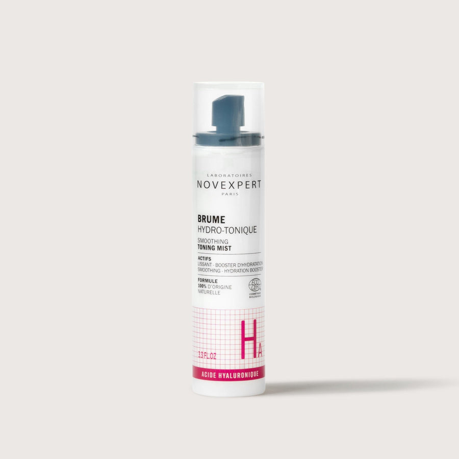 Novexpert Smoothing Toning Mist in a white bottle with a blue cap, front view on a white background