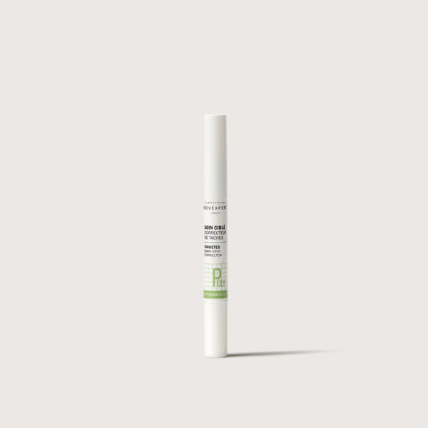Novexpert Targeted Dark-Spot Corrector in a white tube with green accents, standing upright on a white background