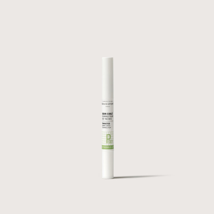 Novexpert Targeted Dark-Spot Corrector in a white tube with green accents, standing upright on a white background