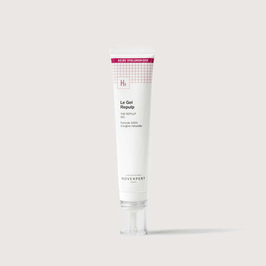 Novexpert The Repulp Gel, a white tube with pink and red accents, featuring hyaluronic acid, on a white background