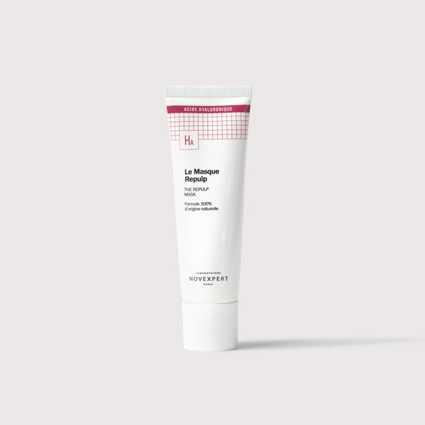 Novexpert The Repulp Mask with hyaluronic acid, a white tube with a pink grid design, shown on a white background
