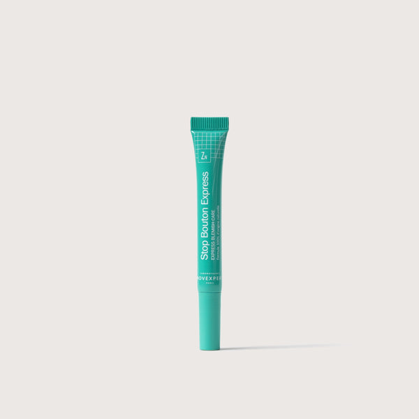 Novexpert Trio Zinc Express Blemish Care in a green tube with a white grid pattern on a white background
