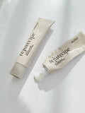 Pestlo Rejurecipe Baku:DN Cream tubes on a white background, one closed and one with cream dispensed