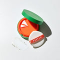 Pestlo Saferecipe No Sebum Grinding Sun Pact SPF50+ PA+++ with a green lid and orange base,