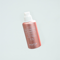 Pestlo T3 PDRN15 Exosome Glow Ampoule in a rose gold bottle with a white pump on a white background