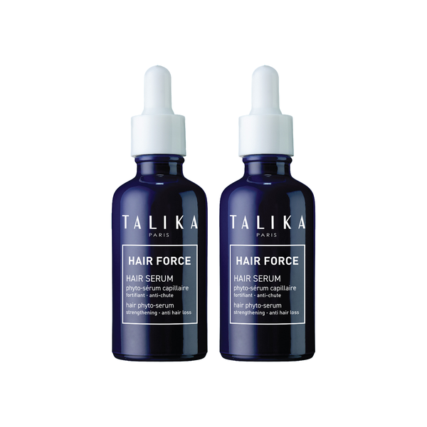 Talika Hair Force Serum, a set of two dark blue bottles with white droppers, displayed on a white background