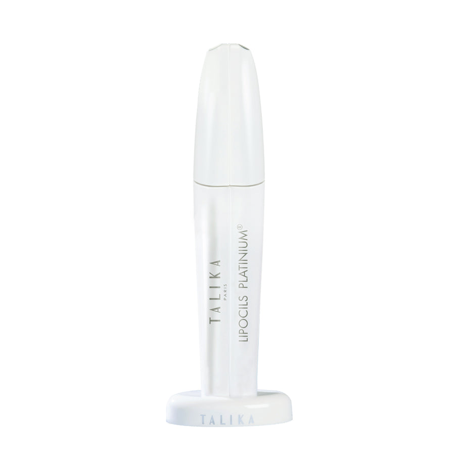 Talika Lipocils Platinium eyelash serum in a white tube with a stand, shown on a white background